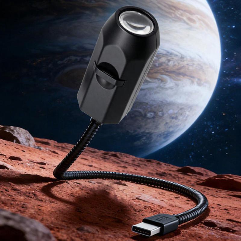 Galaxy projector lamp creating a starry sky effect on a bedroom ceiling